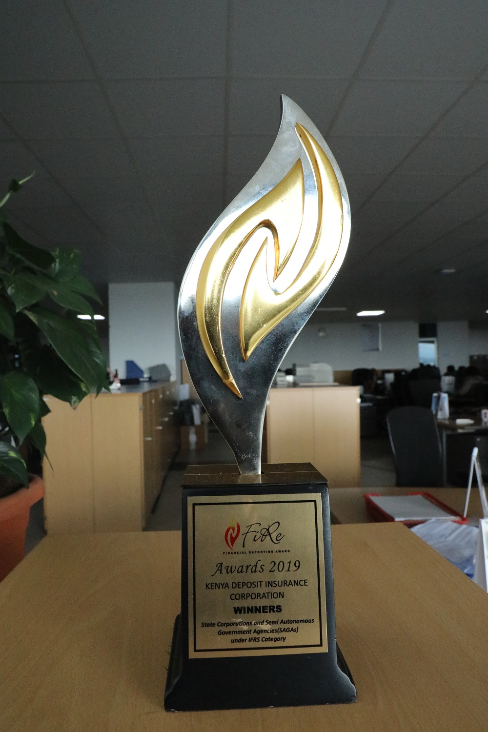 Seeing is believing....The 2019 FiRe Award trophy, a testament to KDIC's prowess in financial reporting.