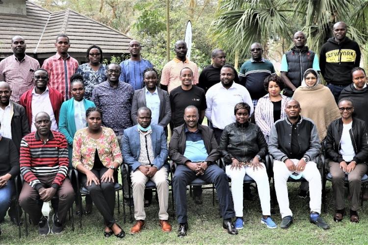 Empowered to serve…! Team Leader Mr. Mohamud Mohamud and a section of staff in a group photo during the workshop on Crisis Management and Bank Resolution.