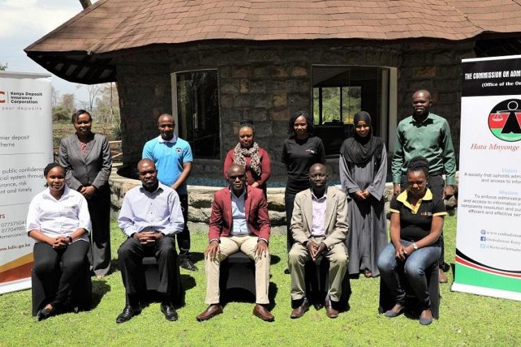 The KDIC Complaints Handling Committee is joined by the CAJ team led by Vice Chair Washington Sati, for a group photo following their training in Naivasha.