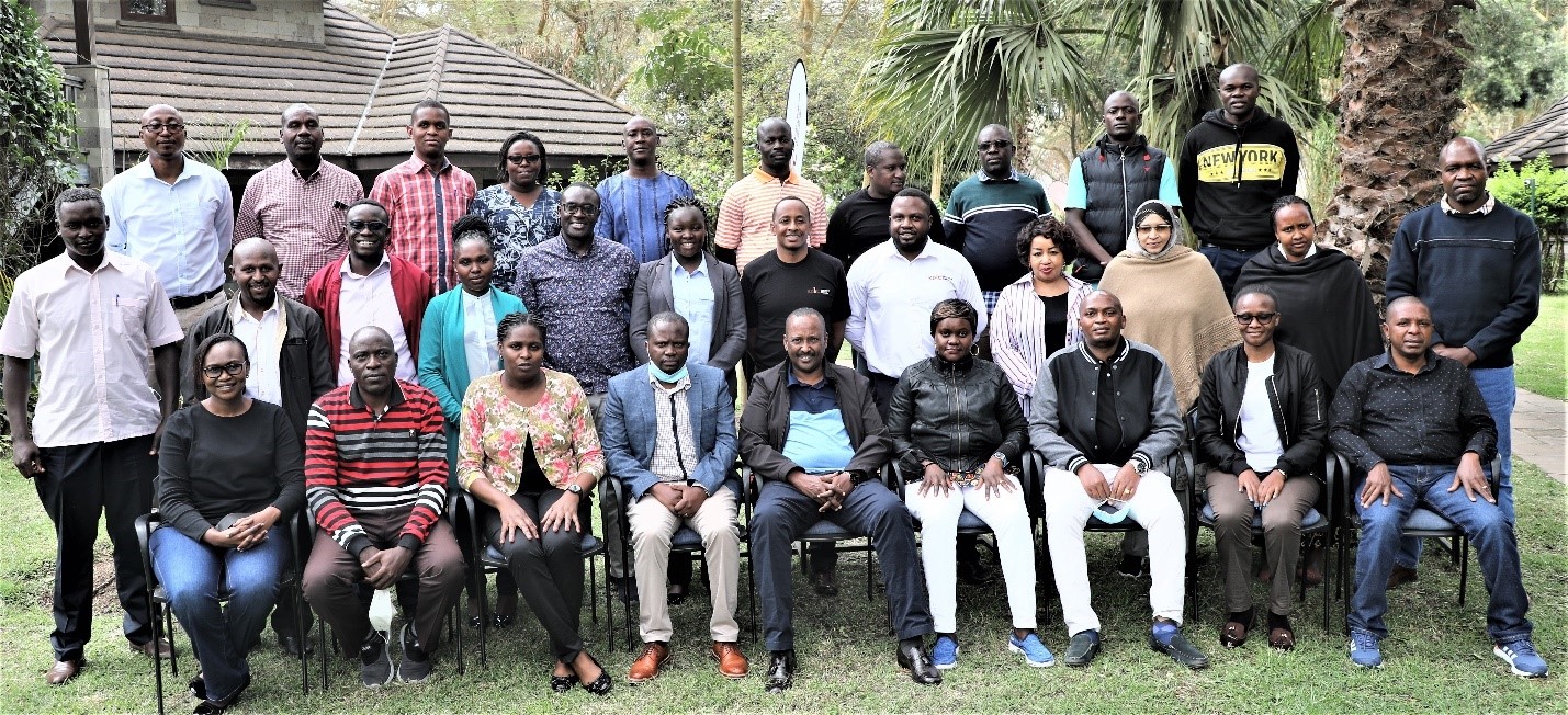 Empowered to serve…! Team Leader Mr. Mohamud Mohamud and a section of staff in a group photo during the workshop on Crisis Management and Bank Resolution.